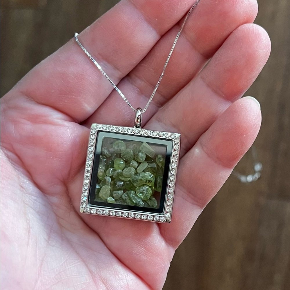 Peridot stone filled locket on a sterling silver s925 20” chain